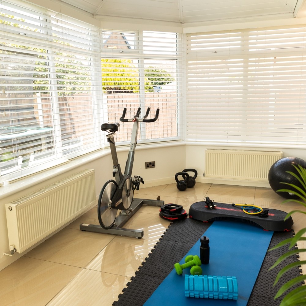 Conservatory with gym equipment